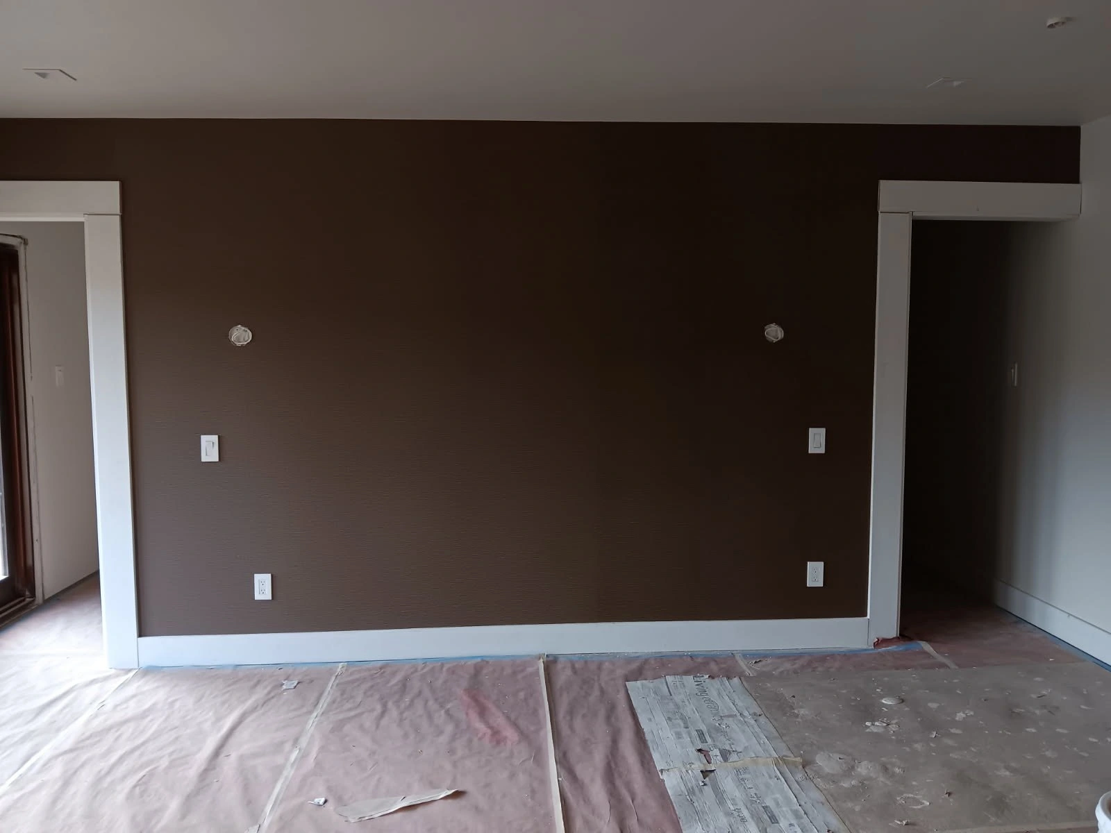 Wallpaper installation process in Sherwood Forest, Detroit